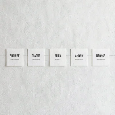 A horizontal timeline of nine package-label iterations evolving left to right on