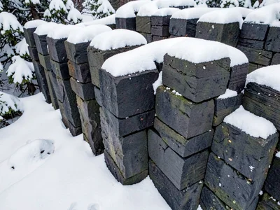 Snow collecting on horizontal column tops