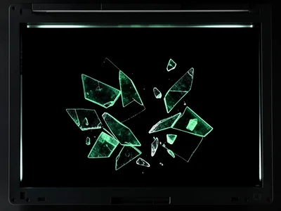 Broken glass pieces on scanner, safety glass fragments catching backlight, trans