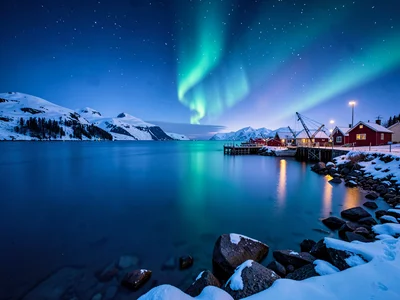 Polar night blue hour in Tromso, Norway, a long exposure of the sea smoothing in