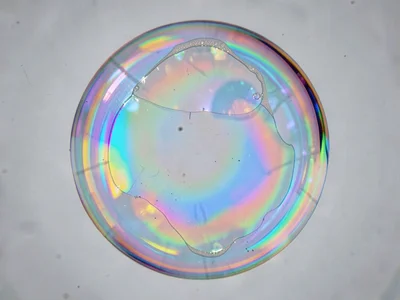 Bubble film draining showing color motion