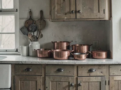 Kitchen with copper pots and wood