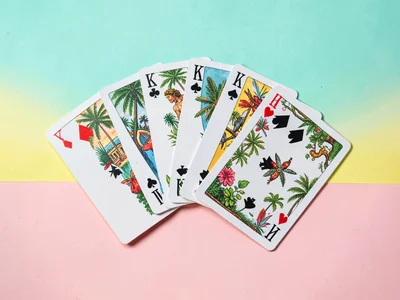 Eight playing cards fanned into a precise arc on a tropical aqua-yellow gradient