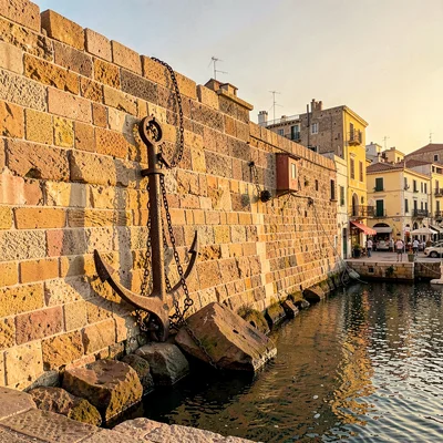 Old Jaffa time-layered, ancient port stone warmth, Iron anchor from centuries ag