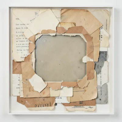 Torn vintage envelope window, acetate window still intact but surrounding kraft 