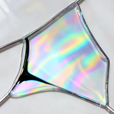 Soap film edge detail at Plateau border, thicker liquid rim where film meets wir