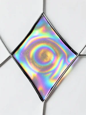 Soap film on a triangular wire frame, Plateau borders dark at edges, center memb
