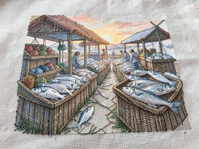 A fish market at dawn with silver fish rendered in metallic thread on the stalls