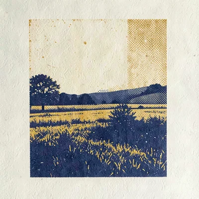 Bold riso art print of a halftone landscape in indigo and mustard spot inks acro