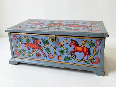 Painted toy chest — exterior kurbits vine panels in four colors on blue-grey gro