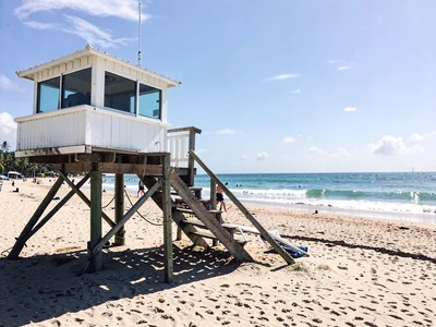 Beach scene with lifeguard tower