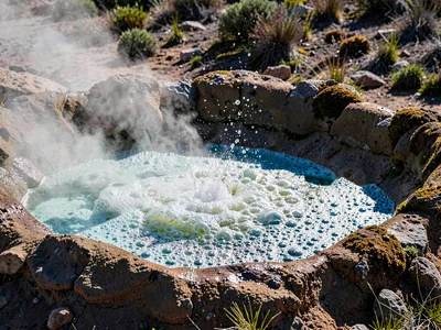 Mud pot bubbling creating texture