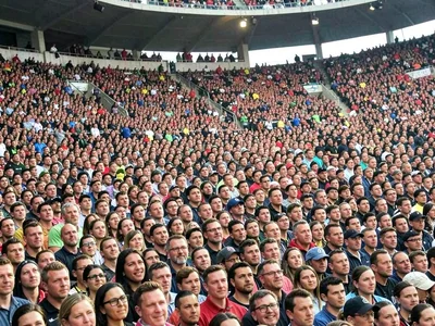 Stadium crowd as wall of faces