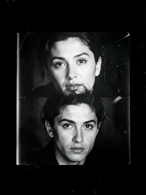 A multiple exposure in the darkroom: the same face printed from three slightly d