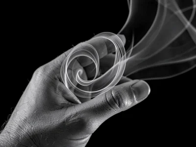 Air current around hand showing finger-induced vortices
