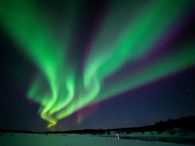 Aurora with rapid motion blur, curtain moving so fast that rays smear into smoot