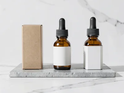 Amber glass dropper bottles in graduated row
