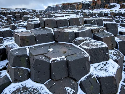 Frost on basalt columns adding white accent