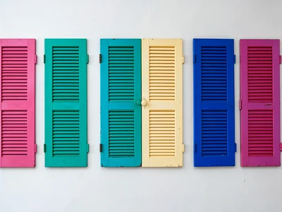 Painted shutters in row