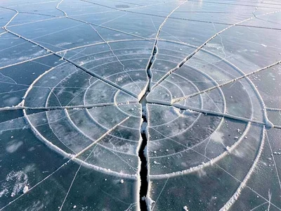 Ice rotation creating spiral crack pattern
