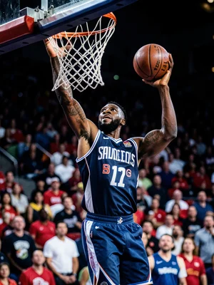 Basketball player going up for a slam dunk, ball in one hand, crowd blurred behi