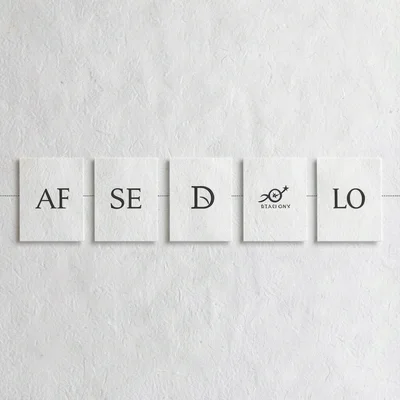 A horizontal timeline of six brand-mark iterations evolving left to right on tex