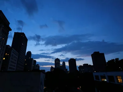 City skyline silhouette at blue hour