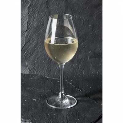 Vertical riso poster of a single tasting glass on a dark slate ground