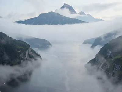 Fjord arms disappearing into mist in sequence