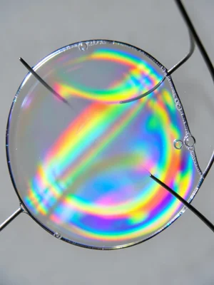 Catenoid soap film between two circular rings, hourglass-shaped minimal surface 