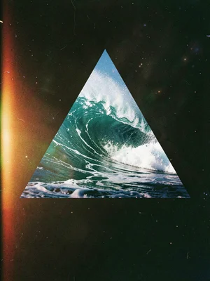 Triangle silhouette containing a crashing ocean wave, foam and spray filling the