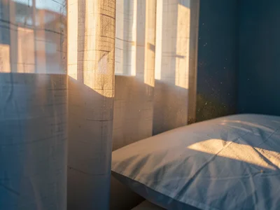 White pillow bisected by morning light edge
