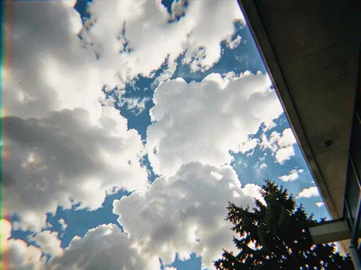 Building edge against clouds fringing