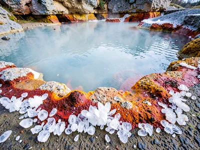 Salt crystals forming at hot spring edge