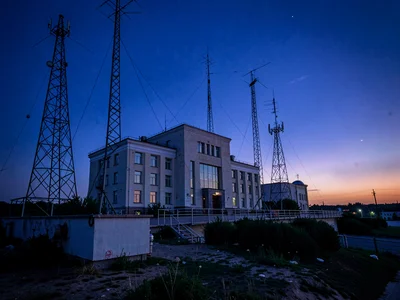 Antenna array against deep blue evening sky