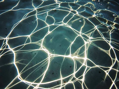 Active caustic from ripple surface