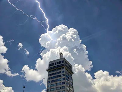 Lightning visible within cloud structure