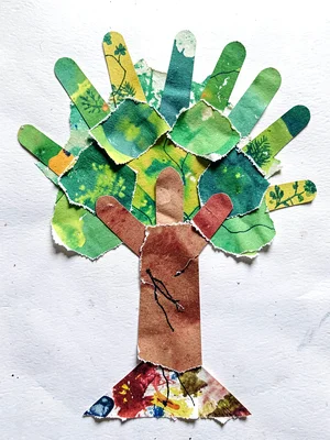 Paper collage tree with handprint leaves
