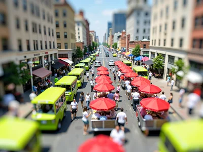Downtown tilt-shift photograph from a hotel rooftop at lunchtime, saturated lime