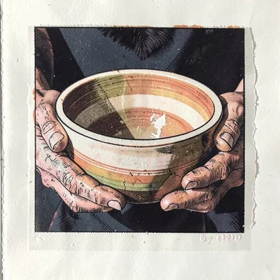 Close-up of hands holding a ceramic bowl — gouge marks following the fingers' di