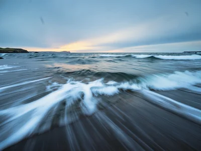Wave energy visible as direction in blur
