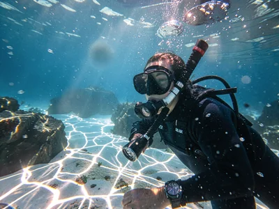 Snorkeler in caustic light
