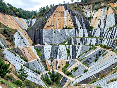 Weathered quarry face showing moss in protected areas