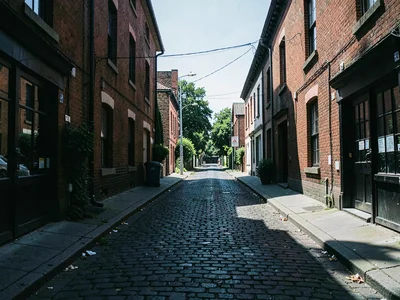 Quiet street between daylight and dark