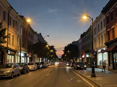 Street lamps just coming on at dusk