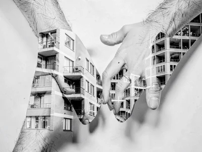 Hands with architectural pattern