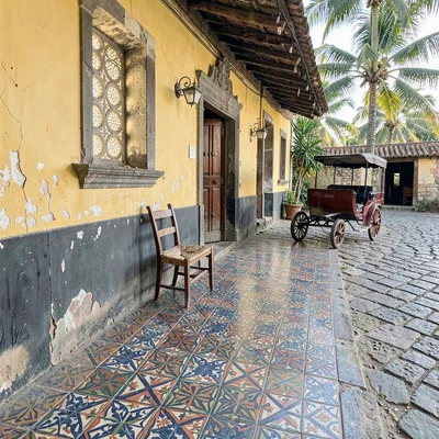 Vigan colonial heritage, Spanish-Filipino fusion, hand-painted floor tiles in an