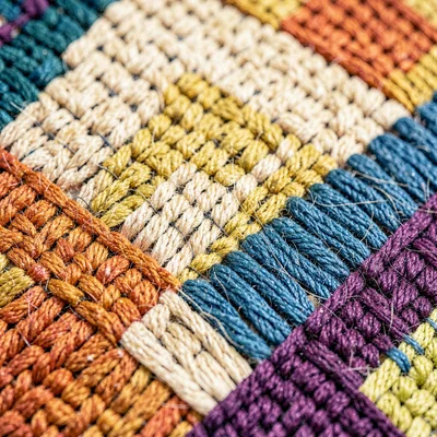 Tight mineral cut of a kilim flatweave structure, sharp diagonal threads and col