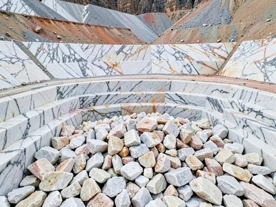 Marble rubble pile creating texture field at base