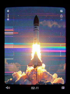 The space shuttle launch, exhaust plume distorted into horizontal color streaks